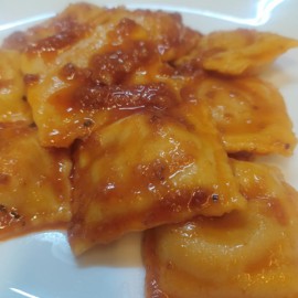 Ravioli di zucca al soffritto